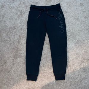black calvin klein sweat pants.